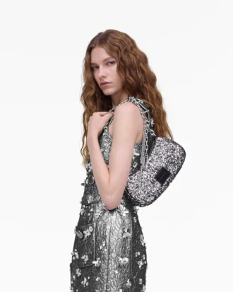 Bolso bandolera con charms de lentejuelas