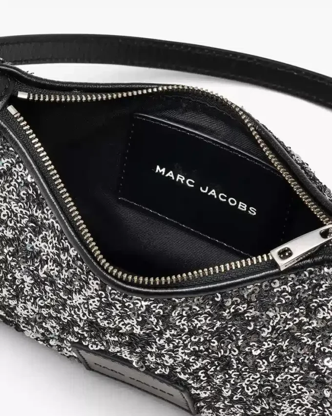 Bolso bandolera con charms de lentejuelas