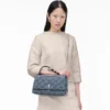 Bolso convertible de denim acolchado