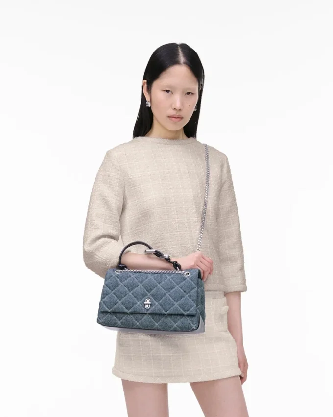 Bolso convertible de denim acolchado