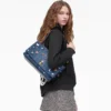 Bolso doble grande de denim con charms
