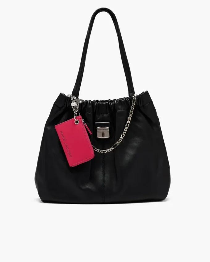 Cartera con cremallera superior y charms