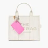 Cartera con cremallera superior y charms