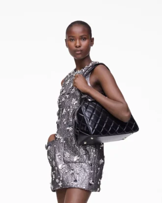 El bolso doble de cuero acolchado El bolso doble de cuero acolchado