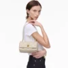 El bolso mini dual acolchado El bolso mini dual acolchado