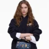 El bolso mini dual de denim con charms