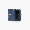 El bolso mini dual de denim con charms