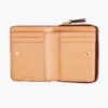 La mini cartera compacta de cuero