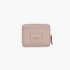 La mini cartera compacta de cuero