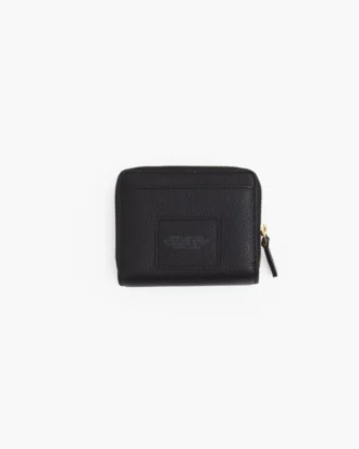 La mini cartera compacta de cuero