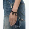 Pulsera con mini charms icónicos pavé