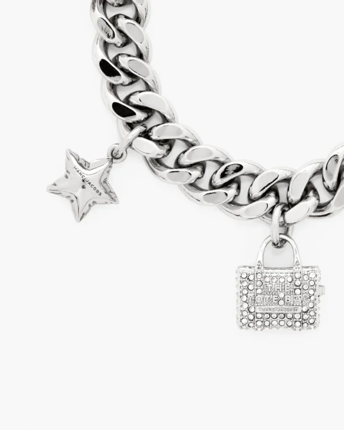 Pulsera con mini charms icónicos pavé