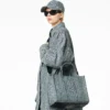 The Medium Tote Bag of washed denim with Monogram