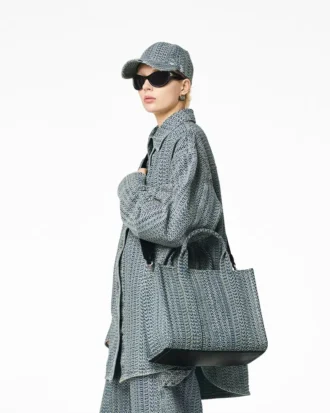 The Medium Tote Bag of washed denim with Monogram