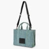 The Medium Tote Bag of washed denim with Monogram