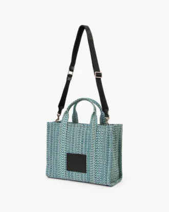 The Medium Tote Bag of washed denim with Monogram