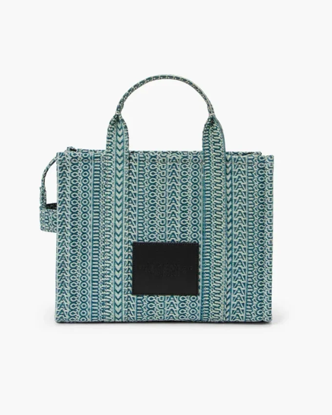 The Medium Tote Bag of washed denim with Monogram