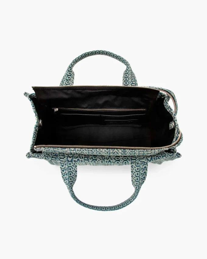 The Medium Tote Bag of washed denim with Monogram
