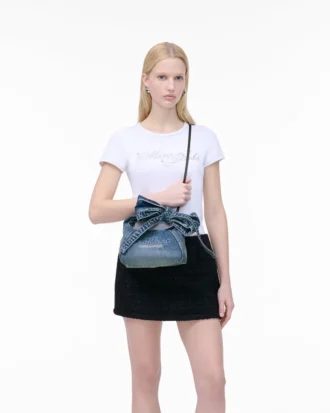 The Sack Bag mini de denim con lazo The Sack Bag mini de denim con lazo