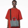 The Tote Bag pequeño de denim lavado con Monogram